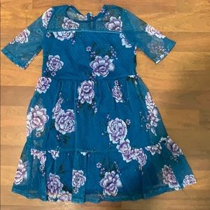 A pretty floral dress. Size S(6/6X)